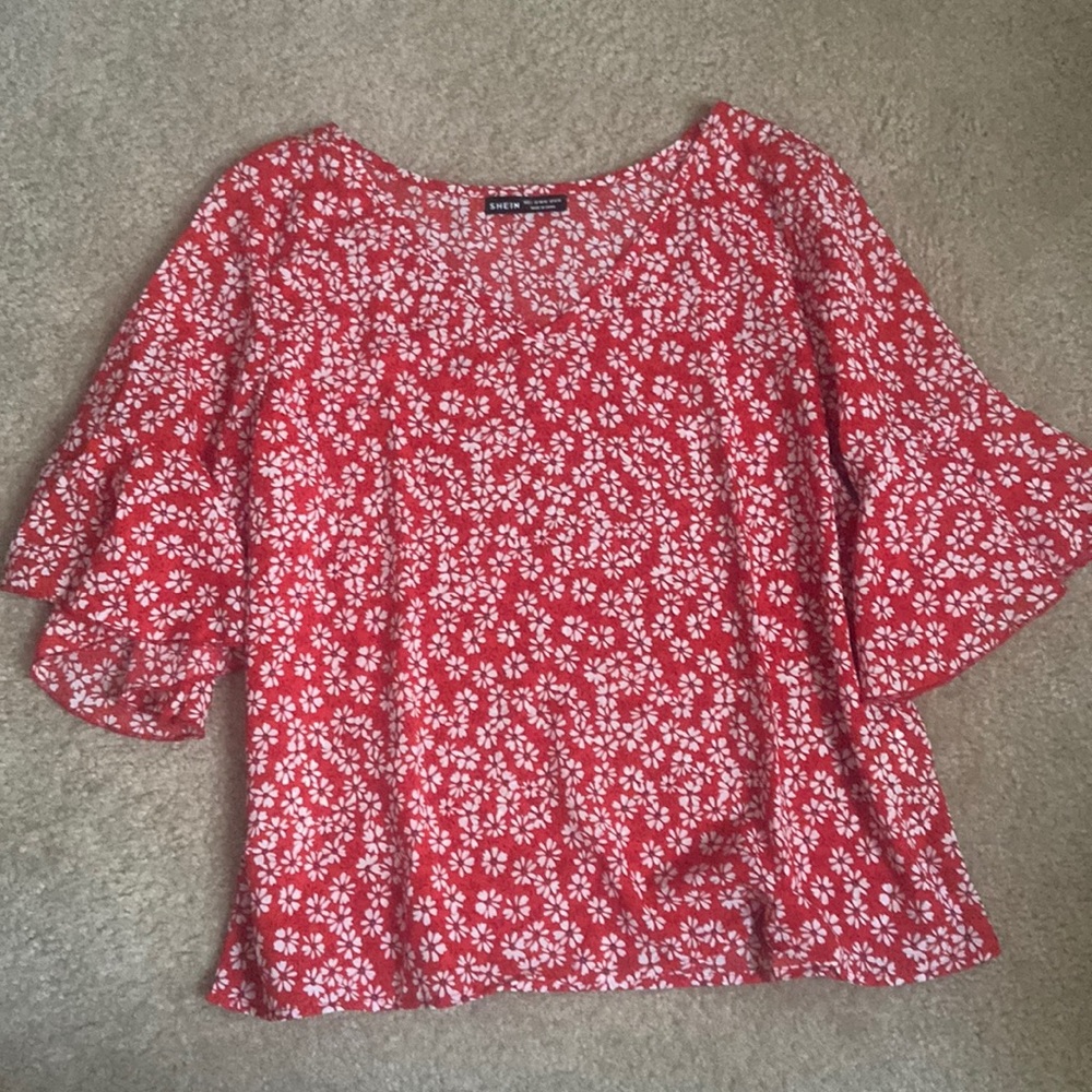 Red 3/4 sleeve shirt with white flowers